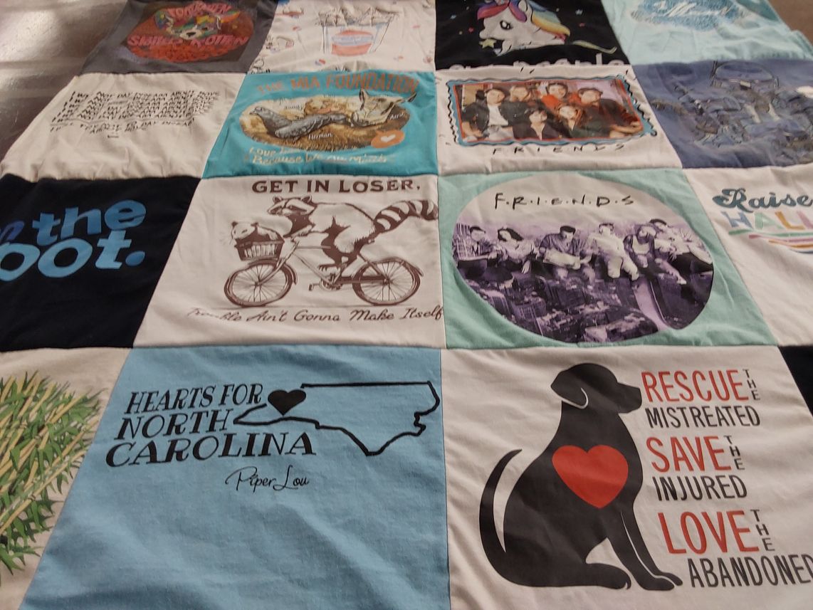 T-shirt quilt with animal rescue, charity themes by Judy from VA