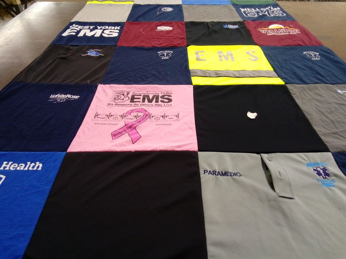 T-shirt quilt with ems, health themes by Audrey from PA