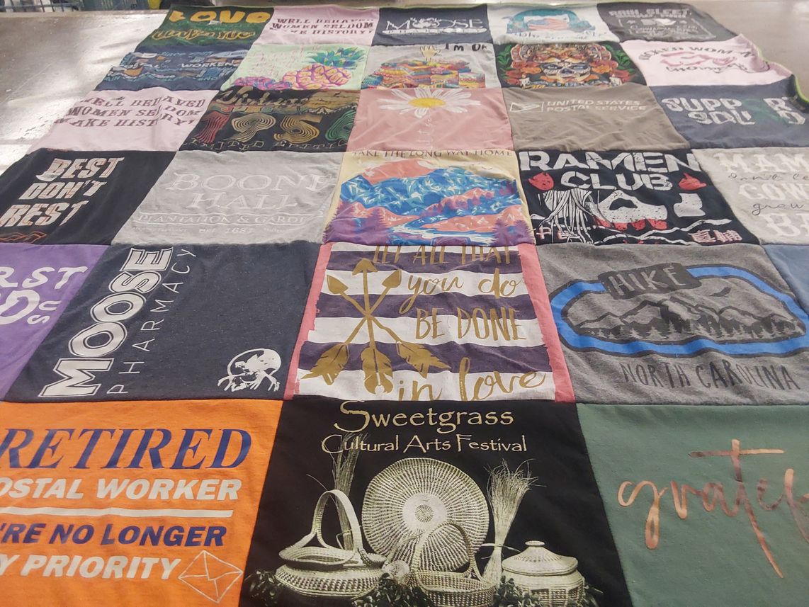 T-shirt quilt with hiking, cultural festivals themes by Barbara from SC