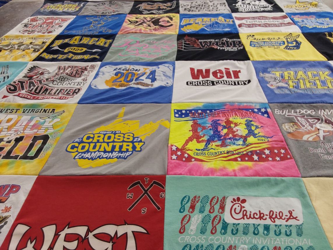 T-shirt quilt featuring weir high school cross country team by Sarah-Marie from WV