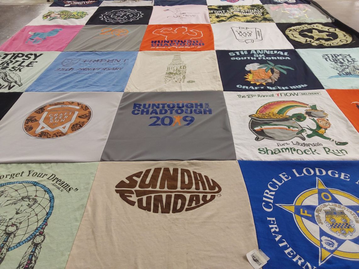T-shirt quilt with running, craft beer themes by Michele from FL