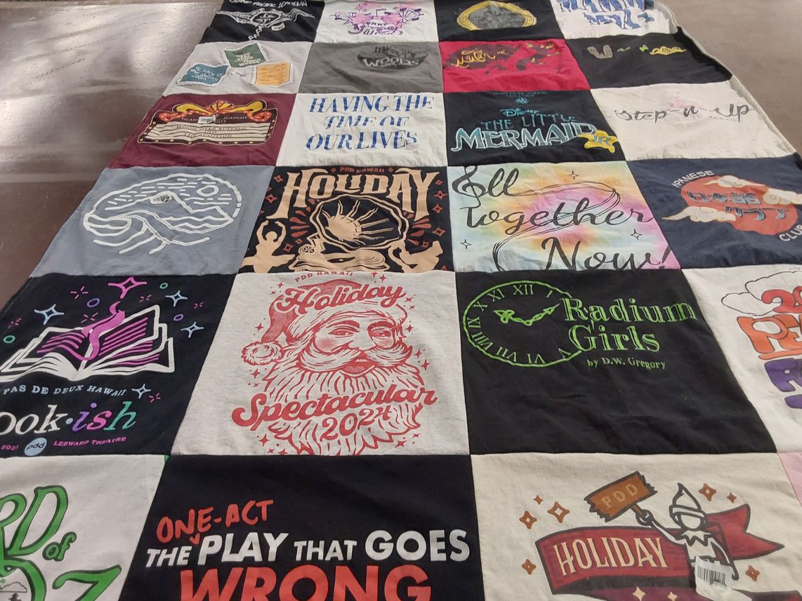 T-shirt quilt with theater, performing arts themes by Kym from HI