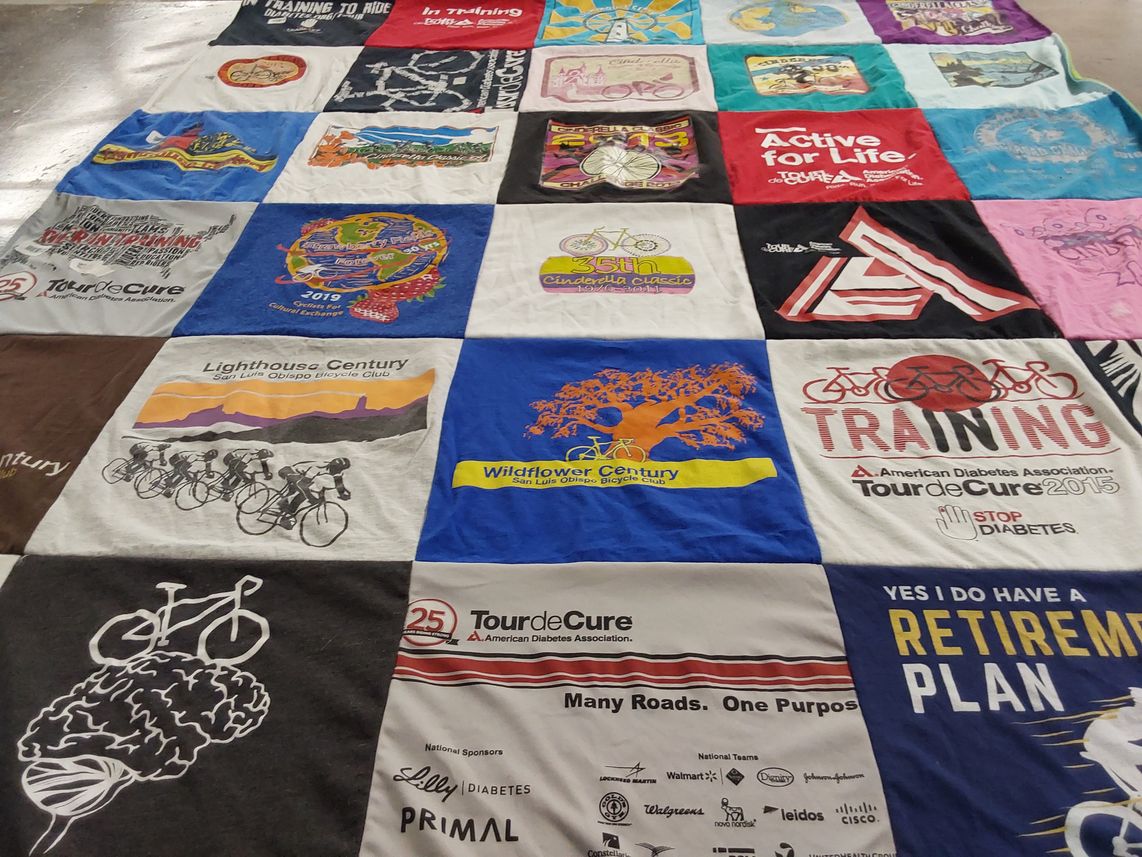 T-shirt quilt with cycling, biking themes by Ann from CA