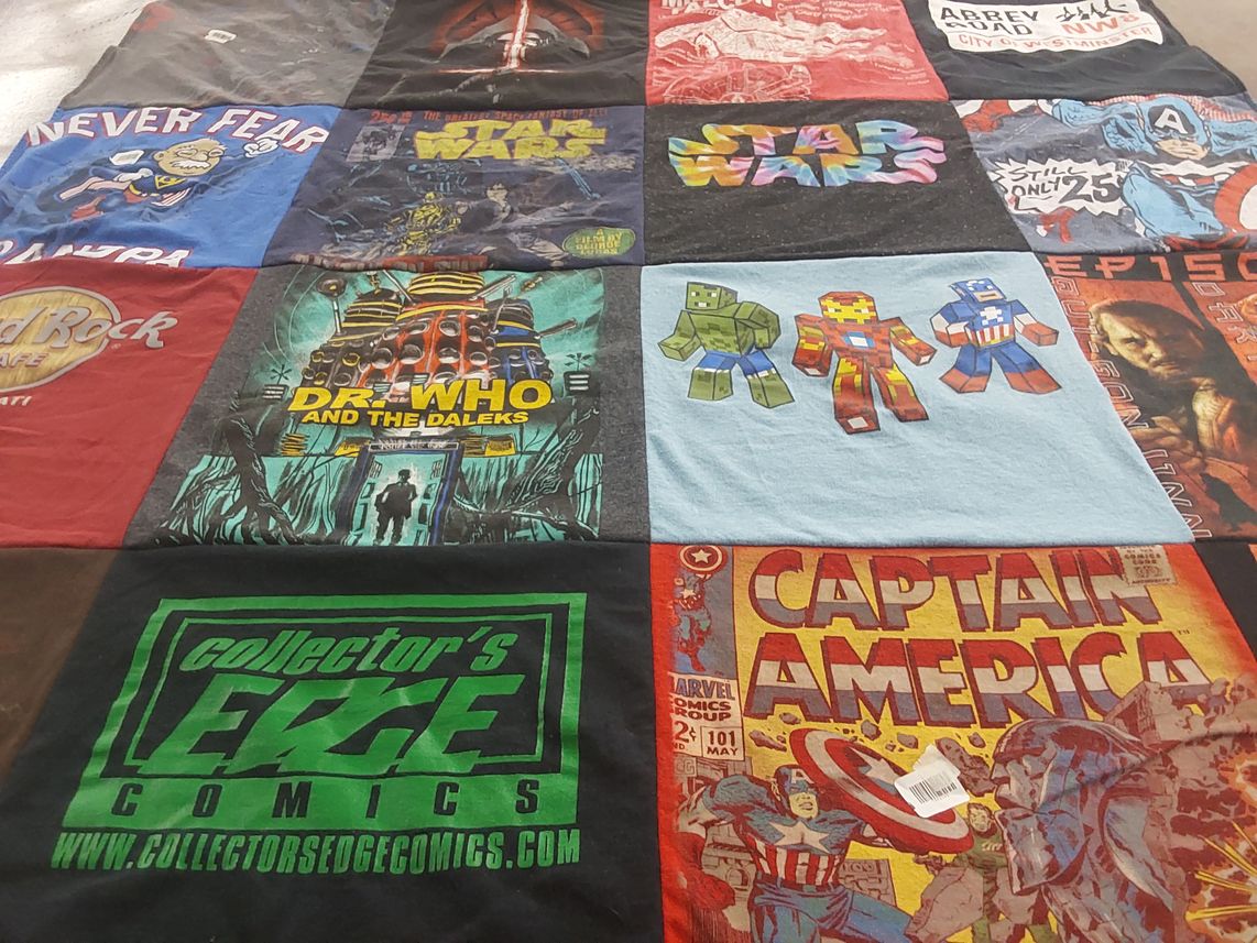 T-shirt quilt with comics, sci-fi themes by vickie from WI