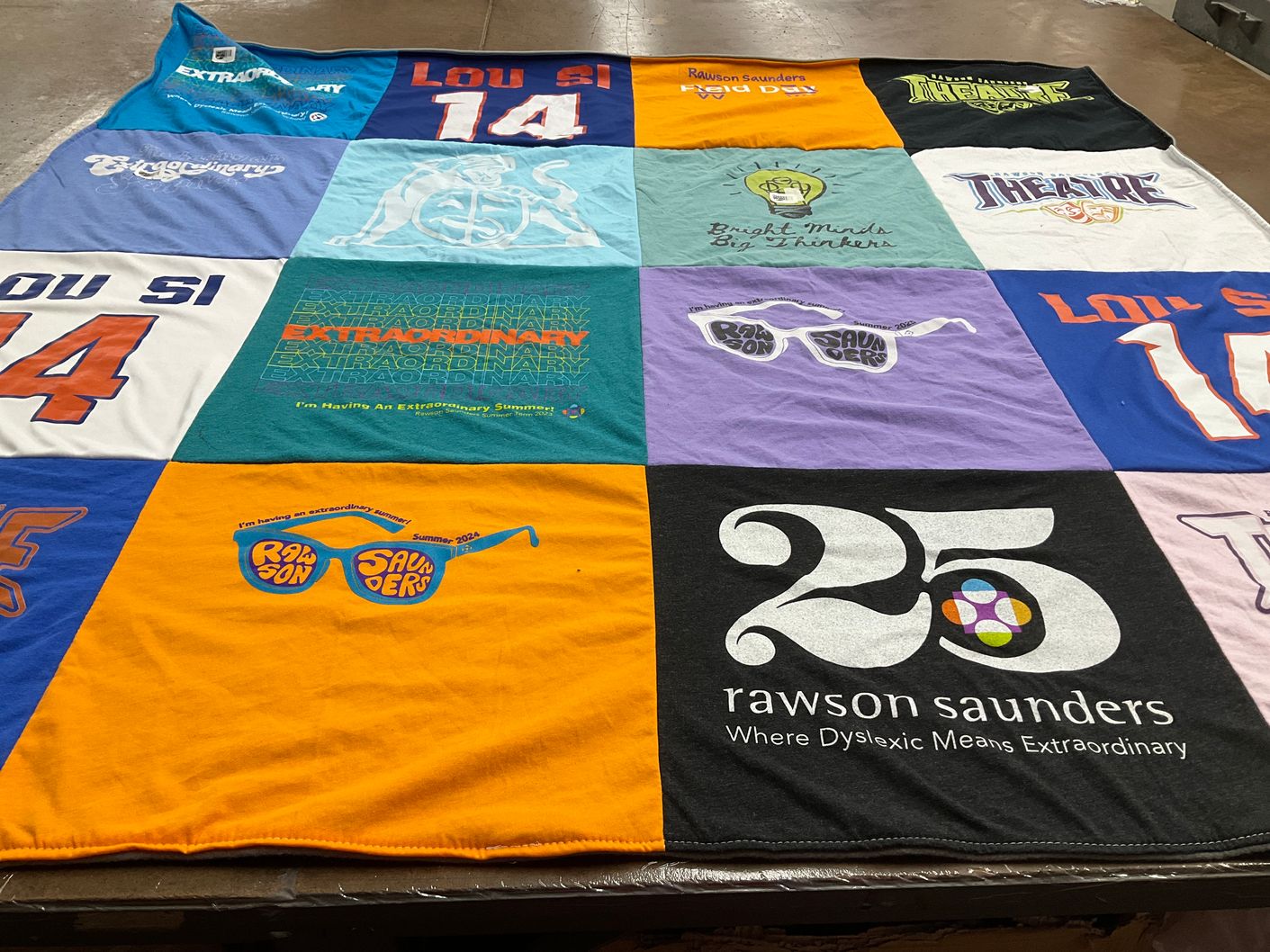 T-shirt quilt with education, theater themes by Ashley from GA