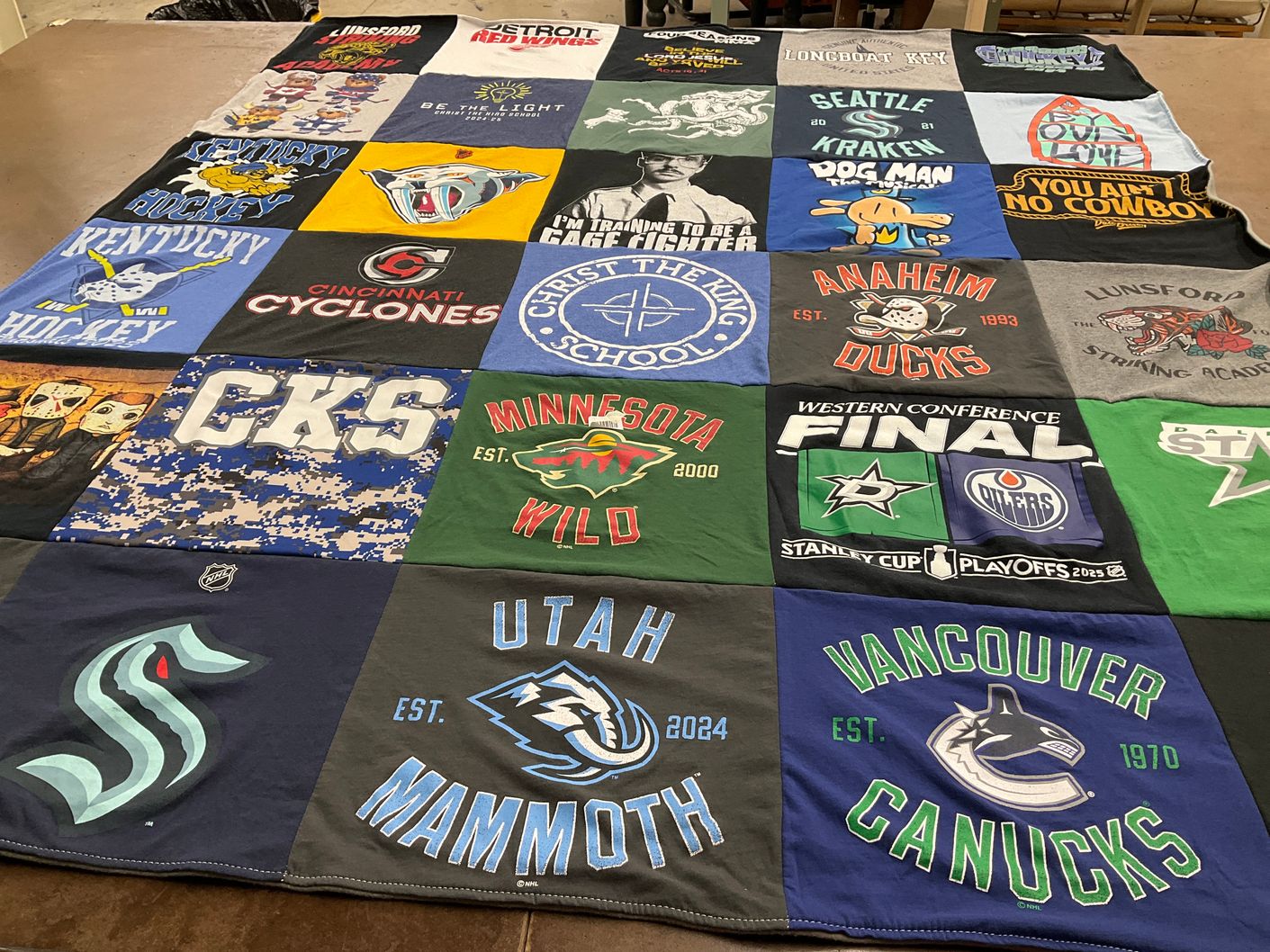 T-shirt quilt featuring detroit red wings, seattle kraken by Amanda from KY