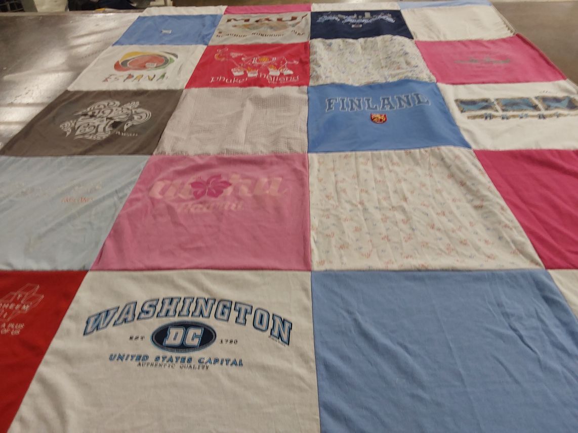 T-shirt quilt with travel, geography themes by Britney from AR