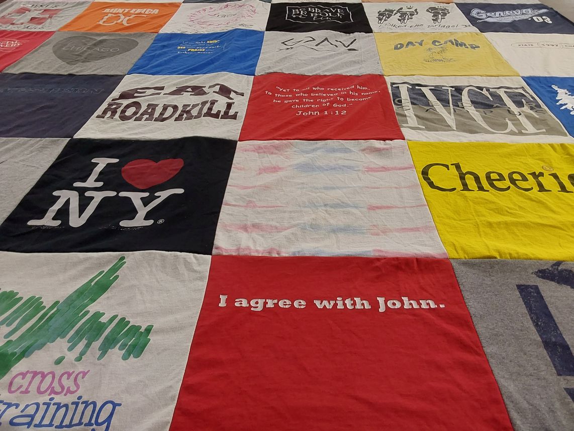 T-shirt quilt with camping, new york themes by Erica from MI