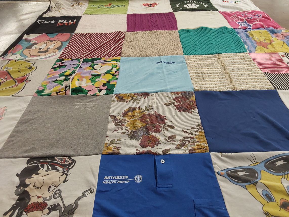 T-shirt quilt with cartoons, healthcare themes by Lillian from MO