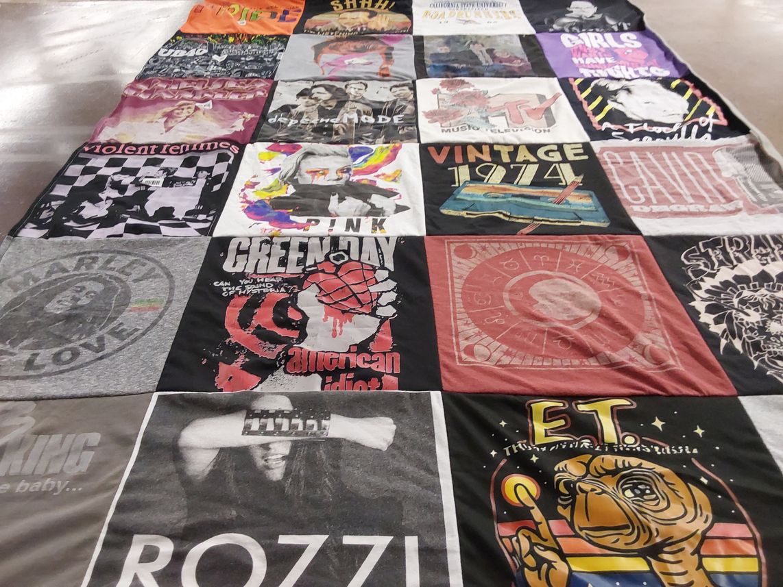 T-shirt quilt with music, pop culture themes by Angela from CA