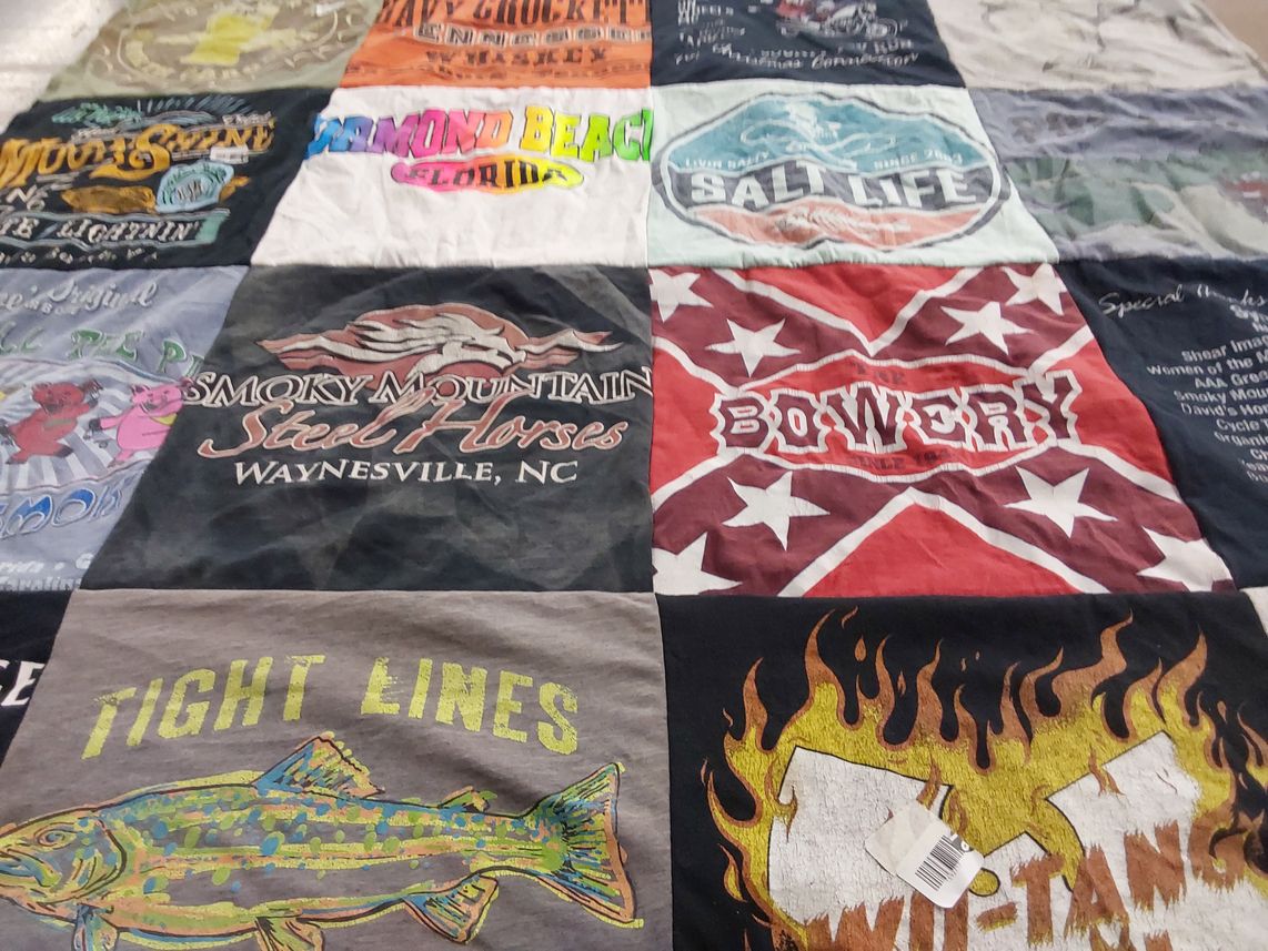 T-shirt quilt with fishing, travel themes by Christina from FL