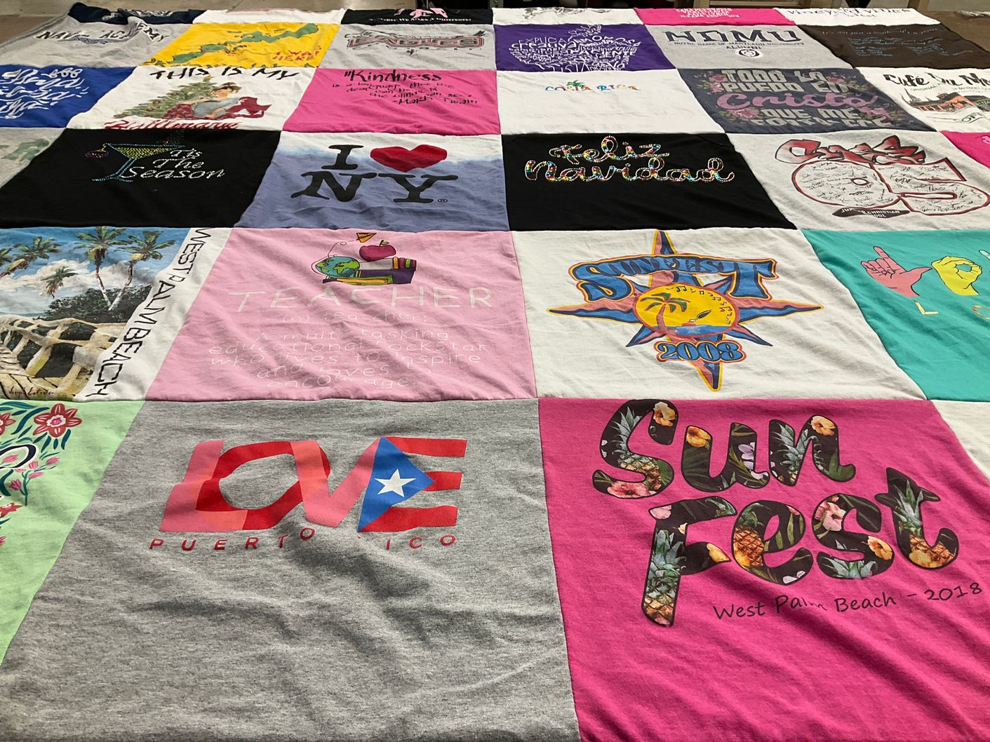 T-shirt quilt with travel, teaching themes by Ivan from FL