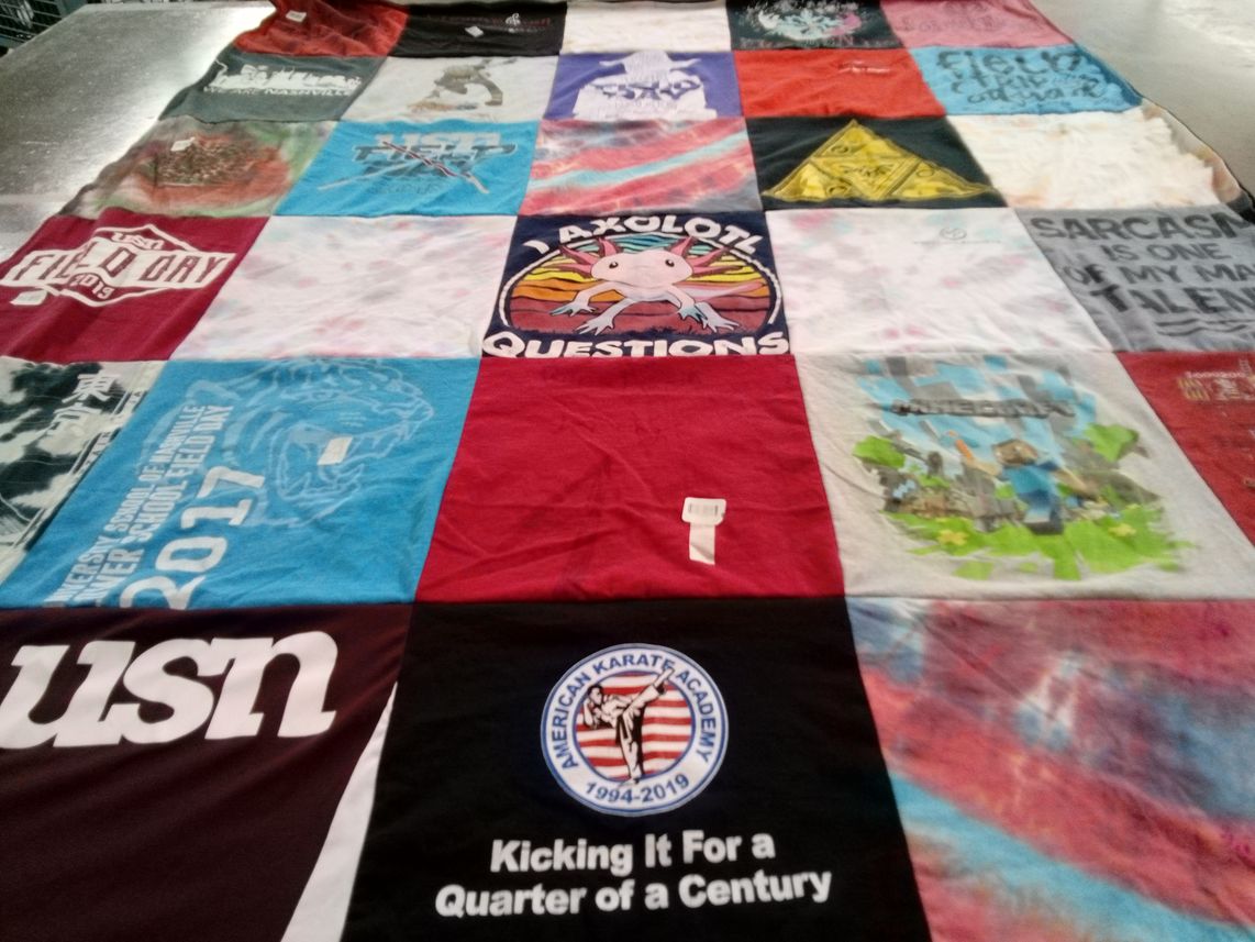 T-shirt quilt with karate, gaming themes by Candice from TN