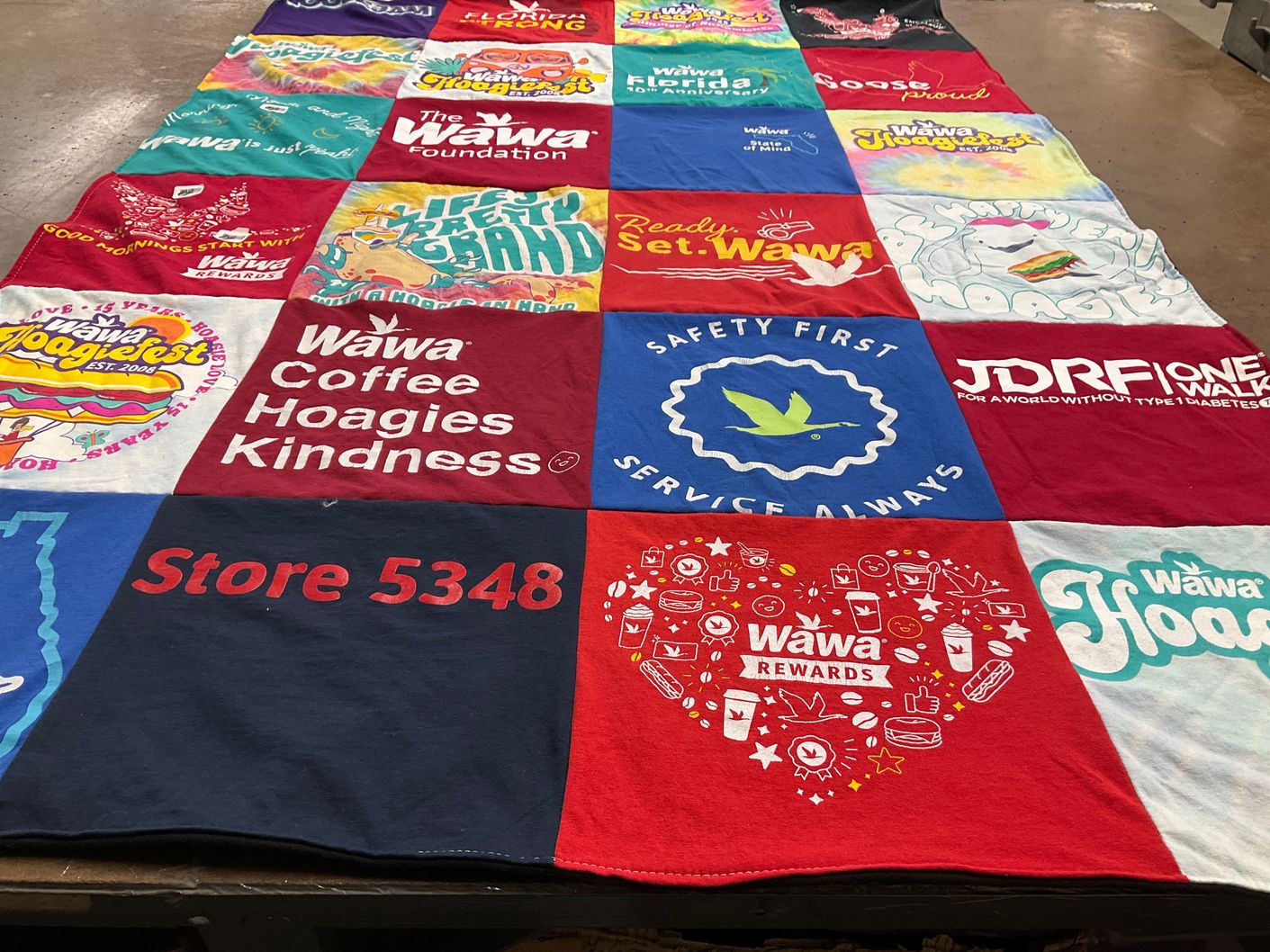 T-shirt quilt with food, community service themes by Samantha from FL
