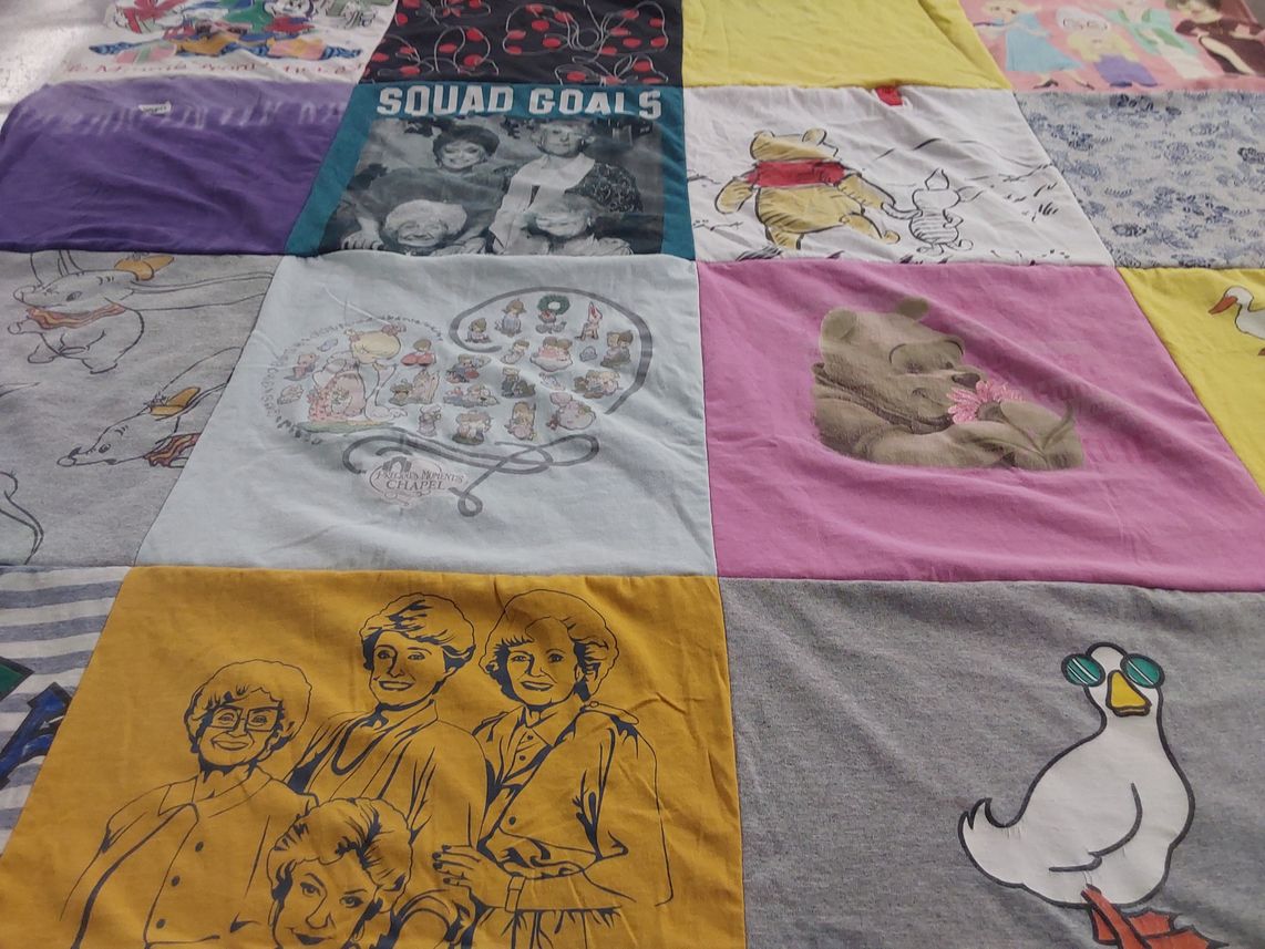 T-shirt quilt with cartoons, pop culture themes by Bryant from NJ