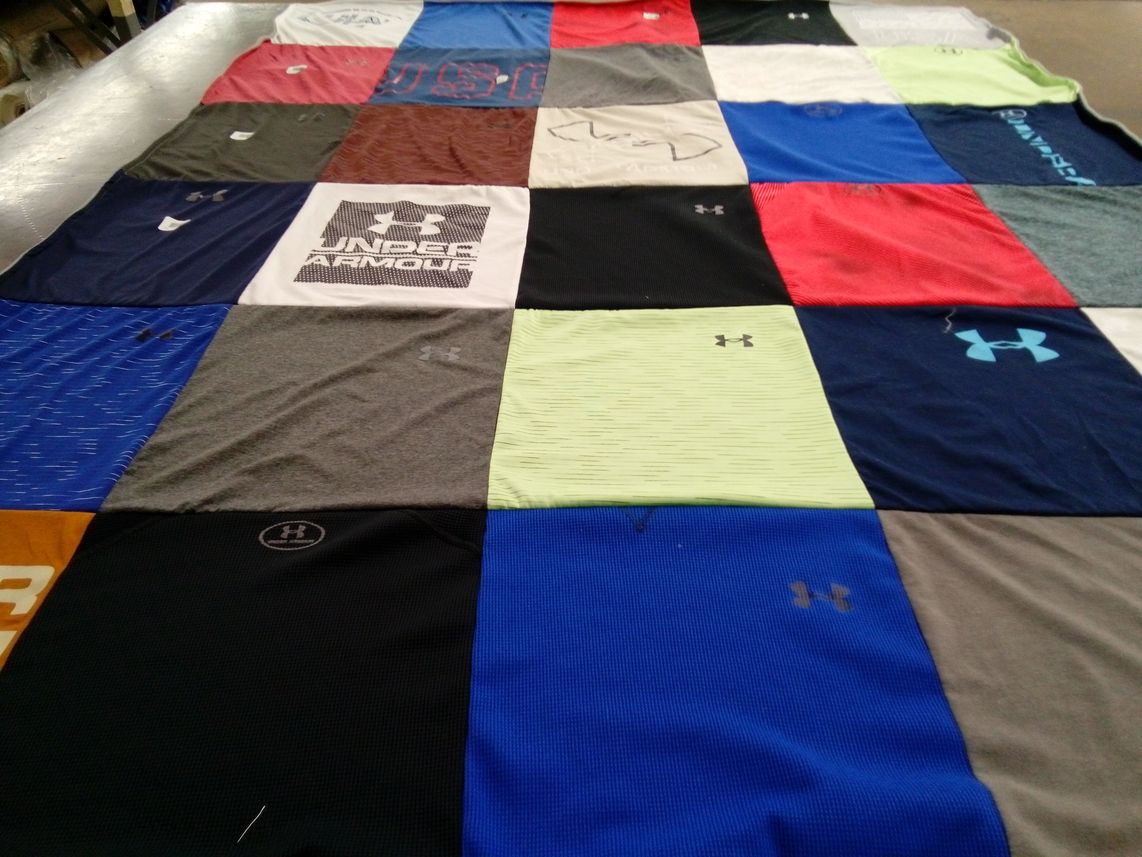 T-shirt quilt with sports, fitness themes by Shalina from GA