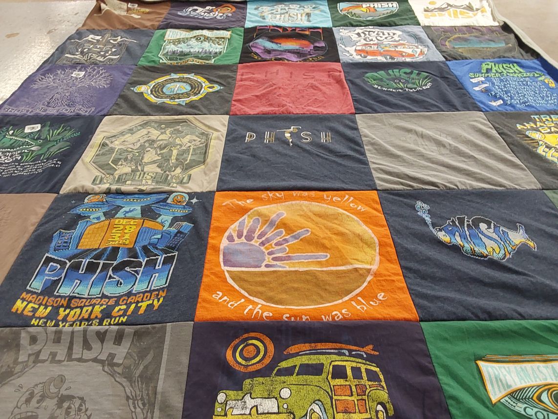 T-shirt quilt with music, concerts themes by Laura from CO