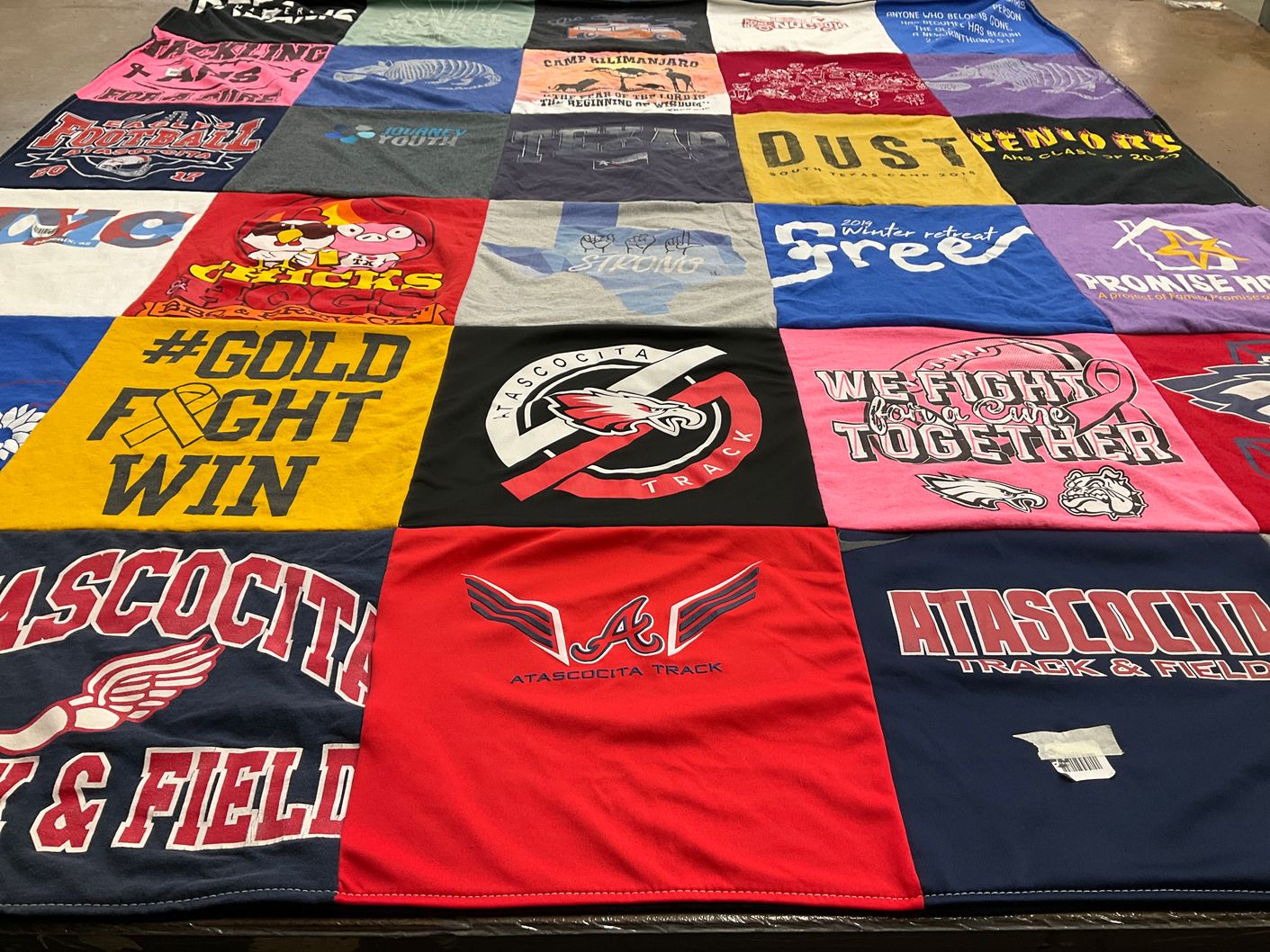 T-shirt quilt featuring atascocita track and field by Daina from TX
