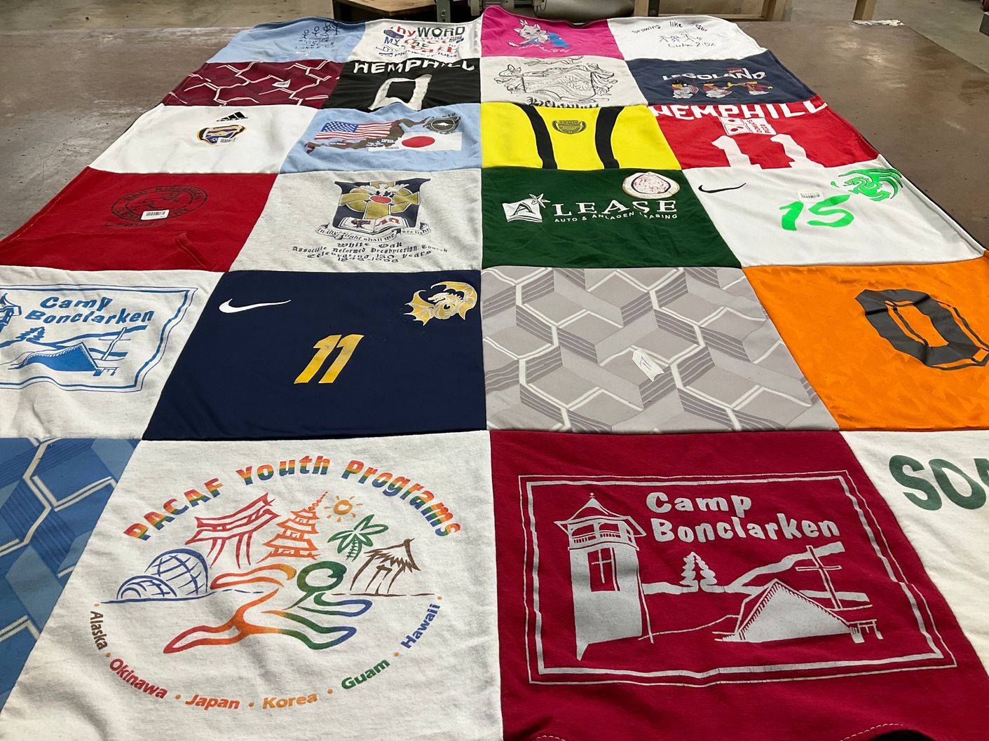 T-shirt quilt with camping, soccer themes by Melinda from GA