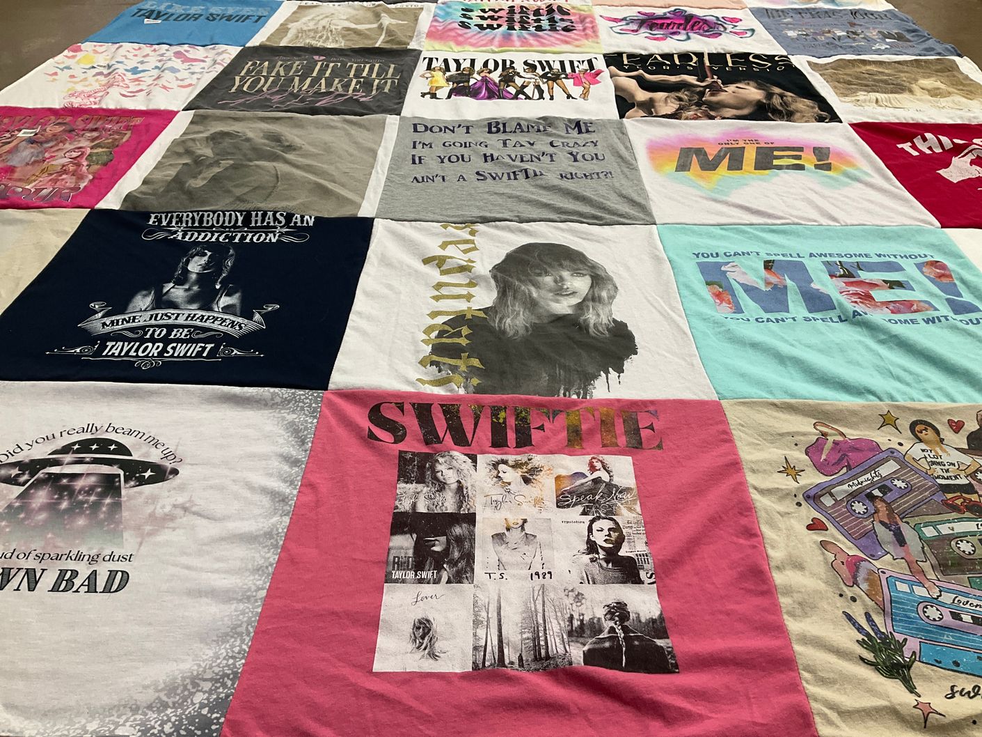 T-shirt quilt with music, pop culture themes by Chambrae from UT