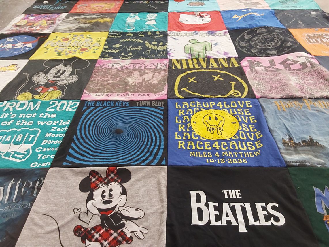 T-shirt quilt with music, movies themes by Valentina from TX