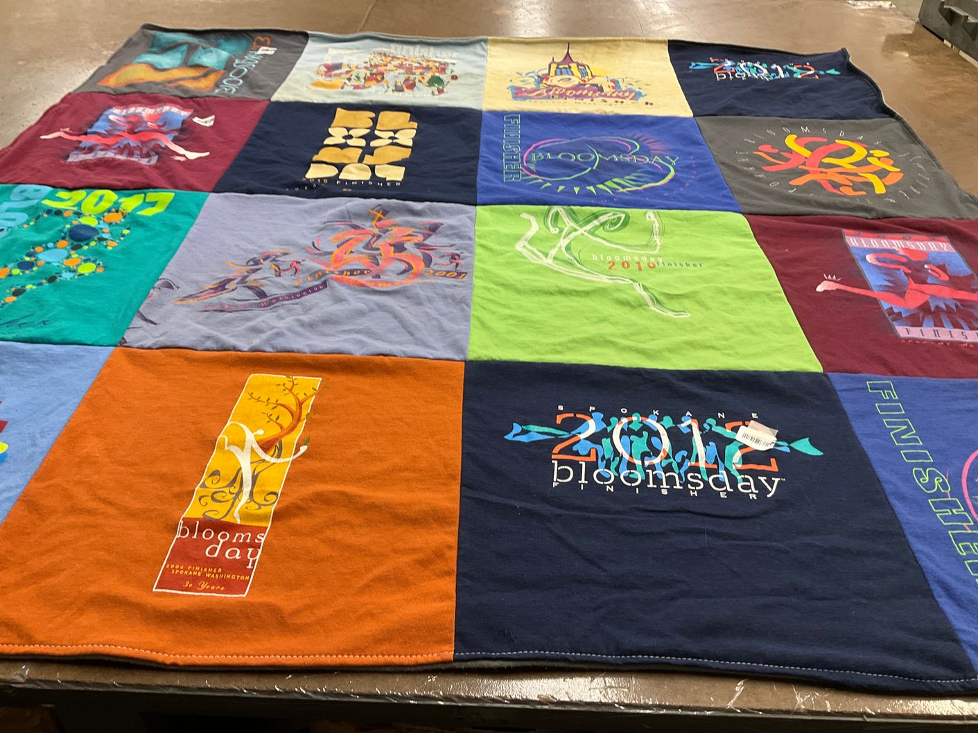 T-shirt quilt with running, events themes by Linda from ID