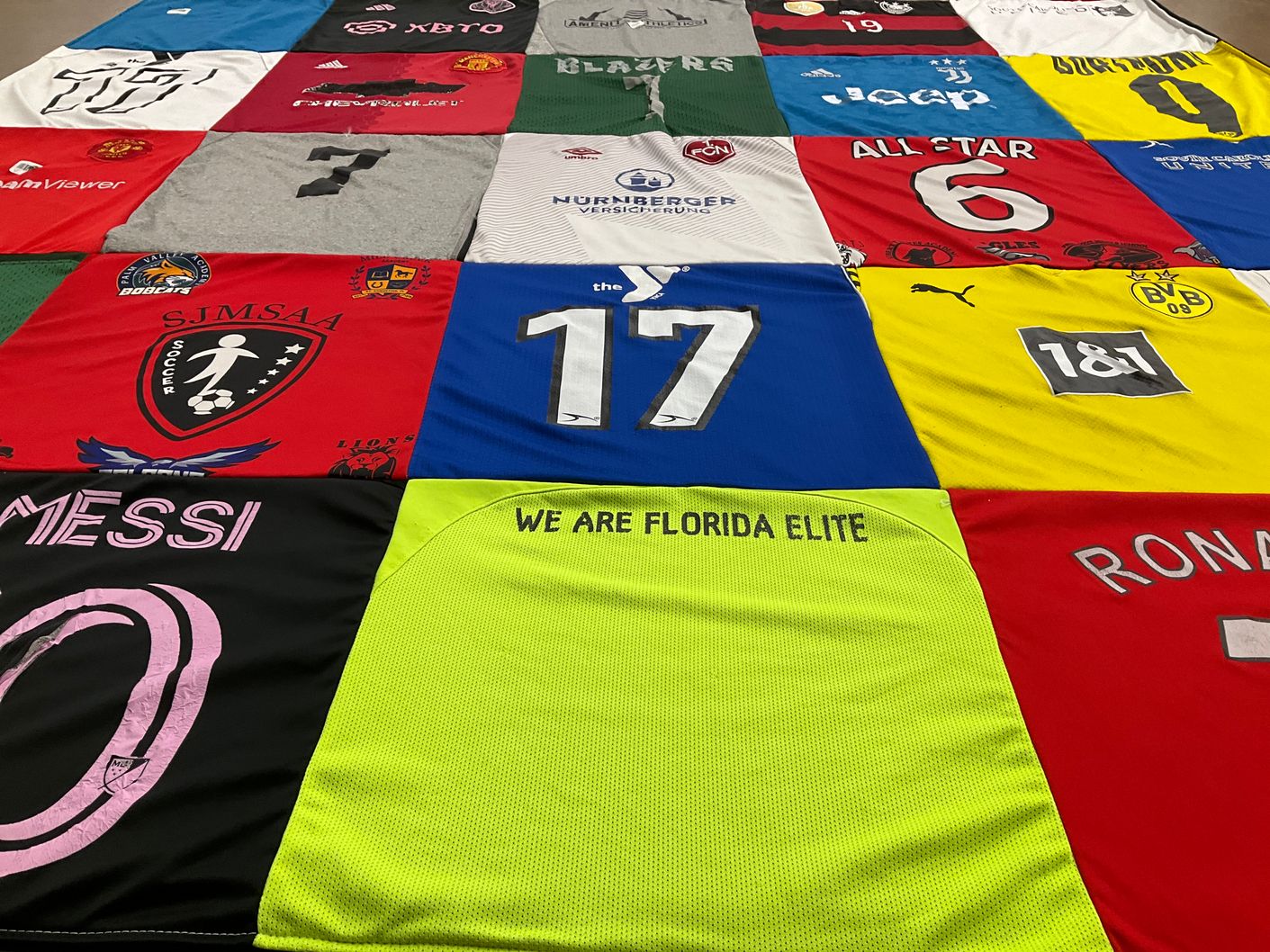 T-shirt quilt with soccer, football themes by Eden from SC