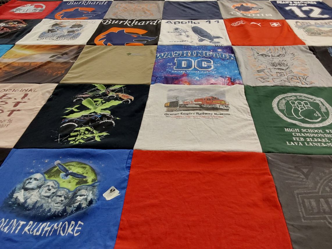 T-shirt quilt with railway, bowling themes by Wendy from NV