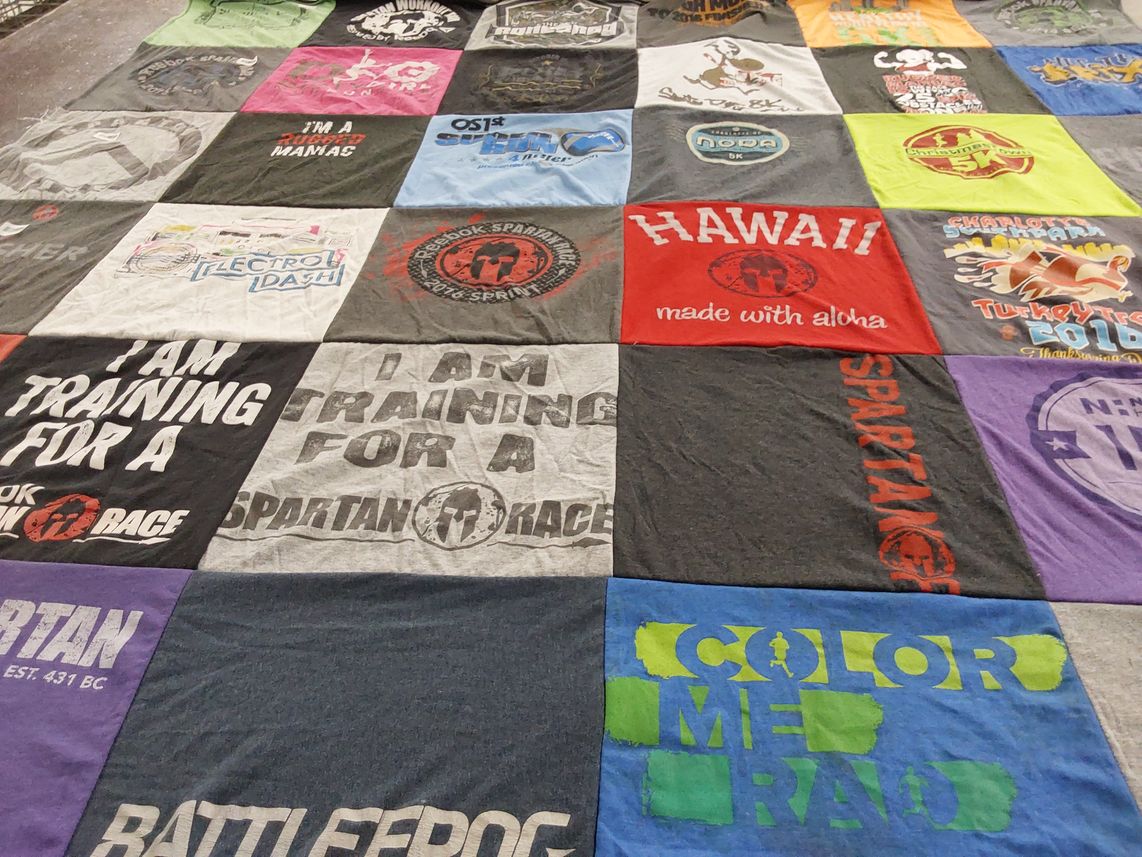 T-shirt quilt with fitness, obstacle course racing themes by Deitra from NC