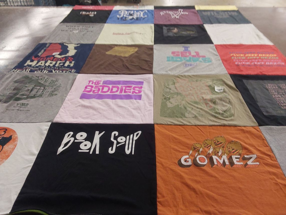 T-shirt quilt with activism, literature themes by Christine from NJ