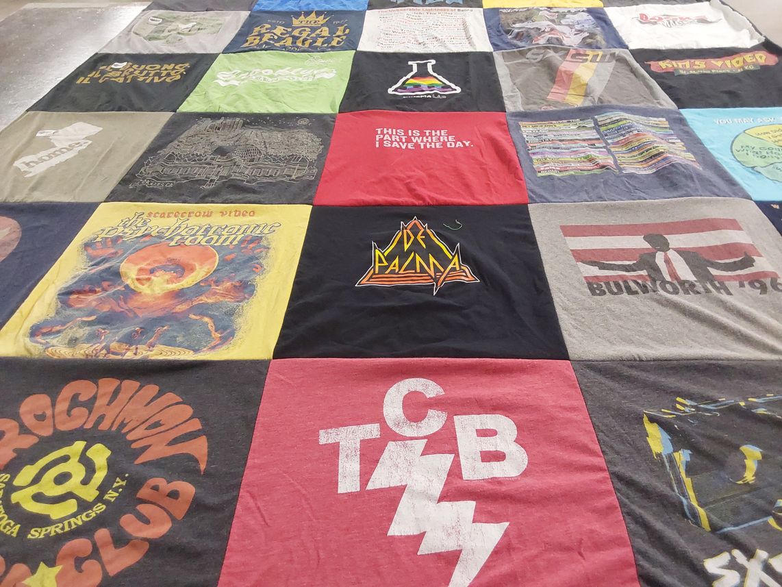 T-shirt quilt with music, movies themes by Christine from NJ