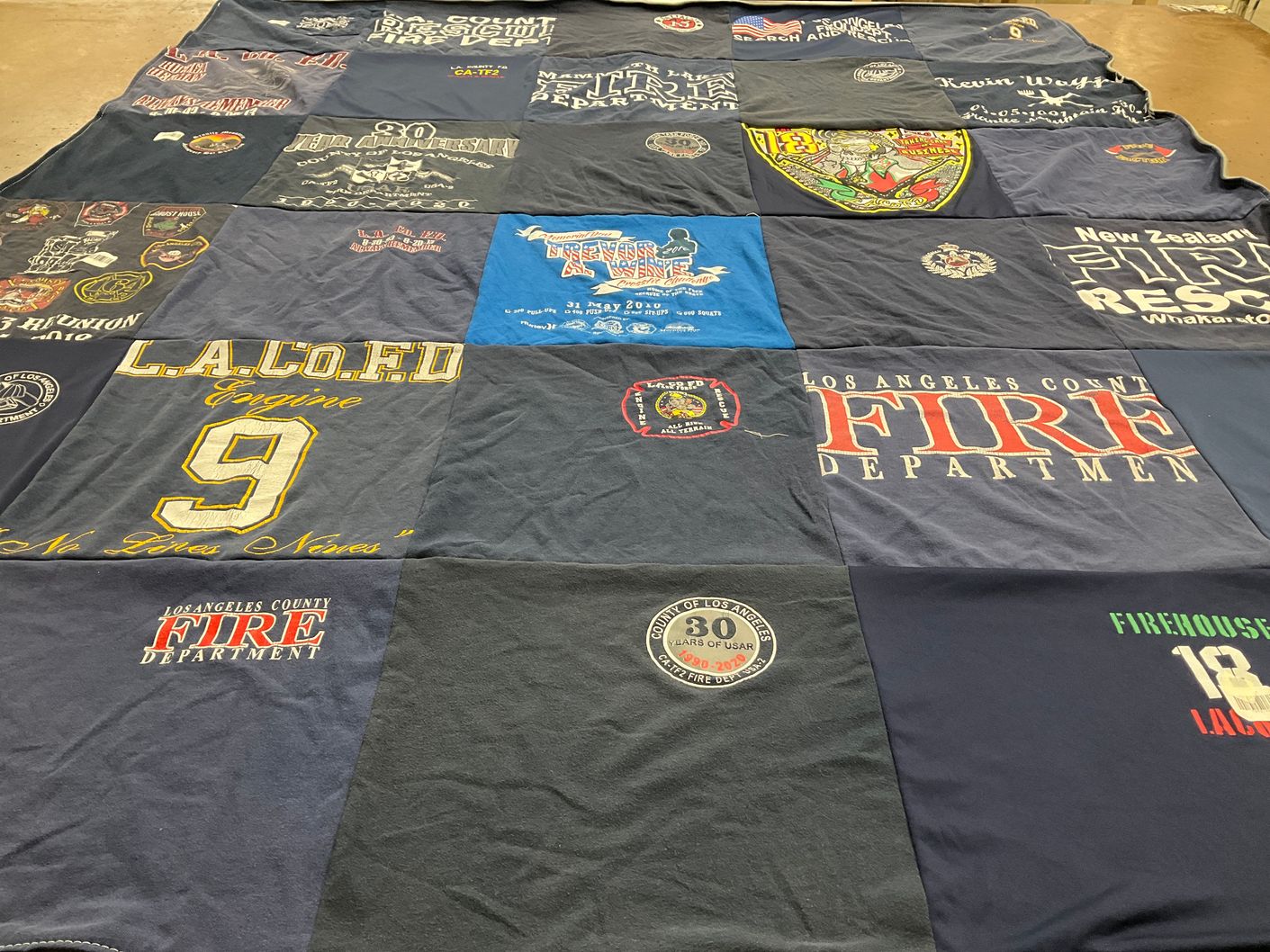 T-shirt quilt with firefighting, emergency services themes by Dan from CA