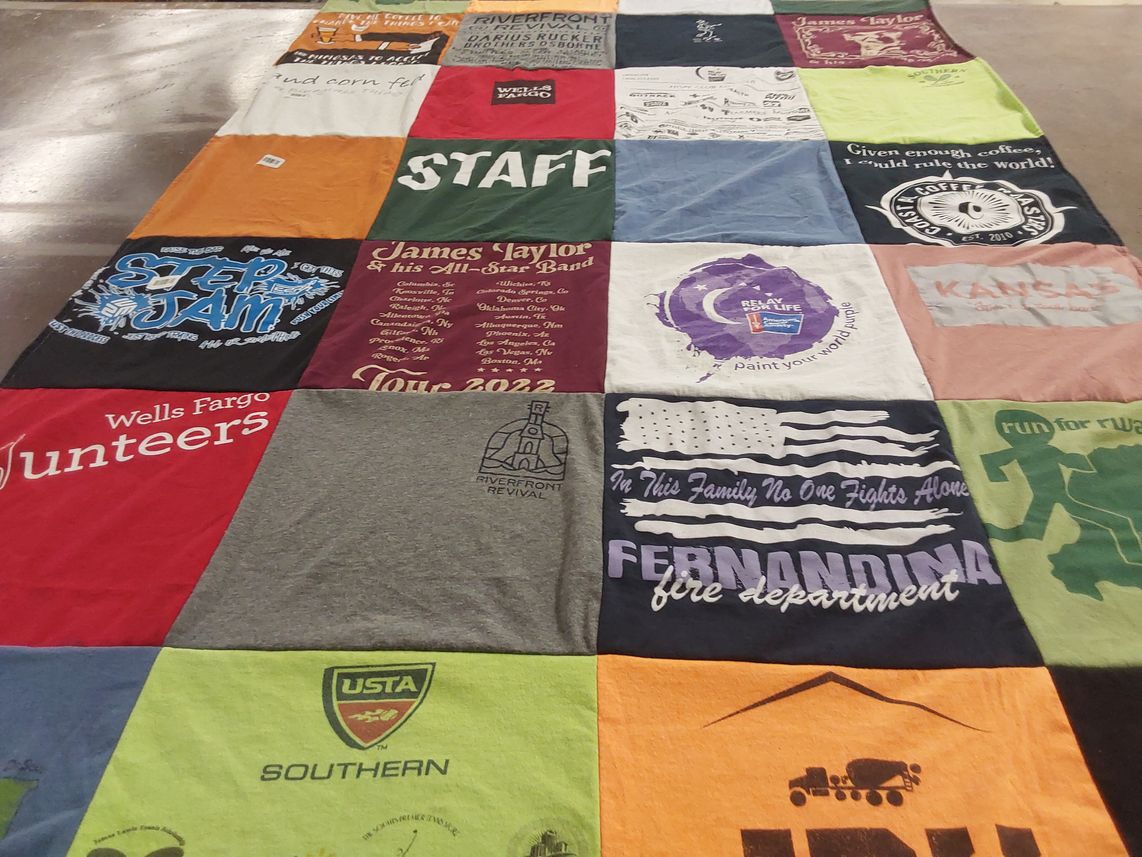 T-shirt quilt with community service, fundraising themes by Sandra from SC