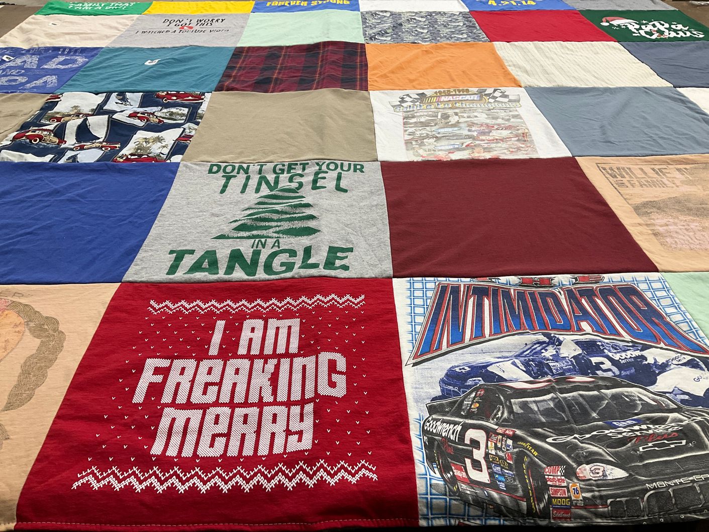 T-shirt quilt with nascar, holiday themes by Lucy from NH
