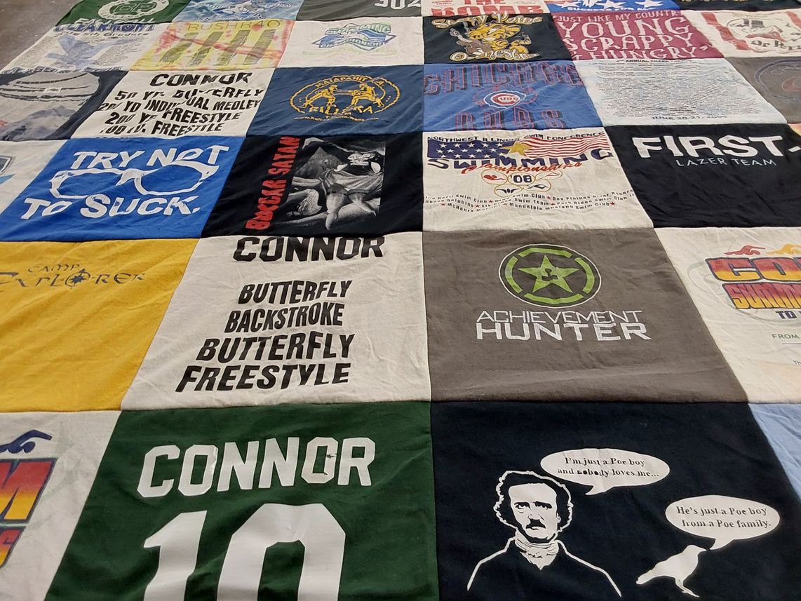 T-shirt quilt with swimming, gaming themes by Connor from TX