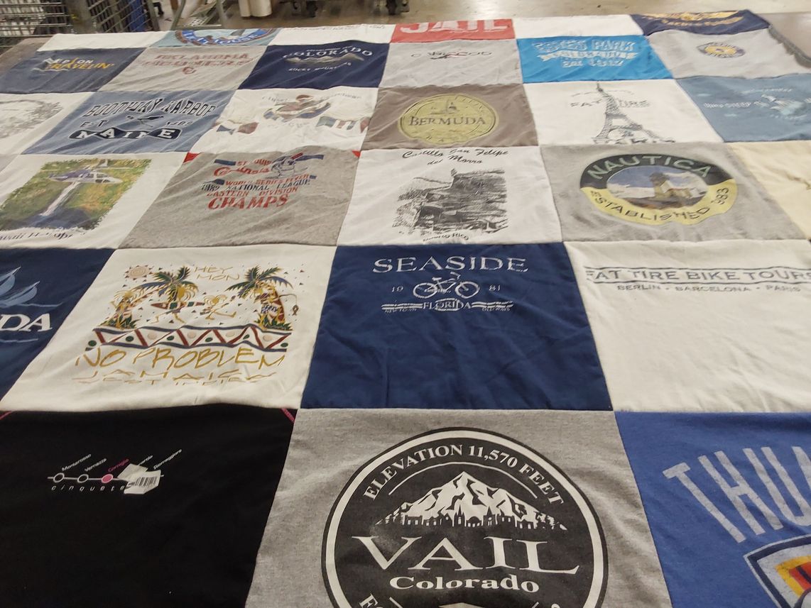 T-shirt quilt with travel, outdoor activities themes by Sandy from OK