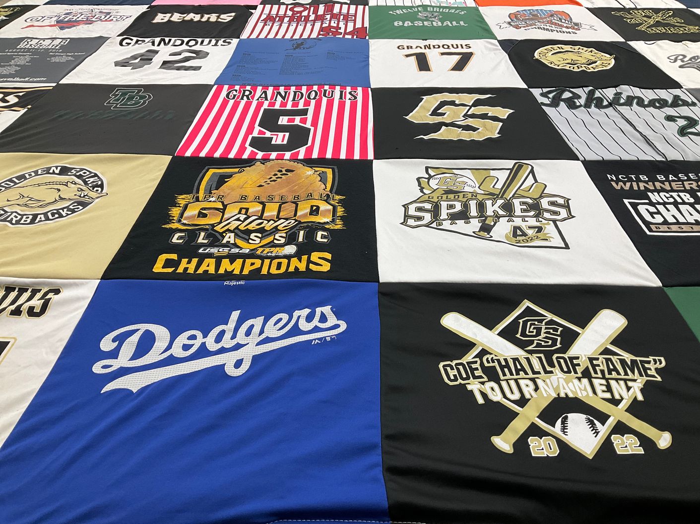 T-shirt quilt featuring golden spikes baseball by Danielle from CA
