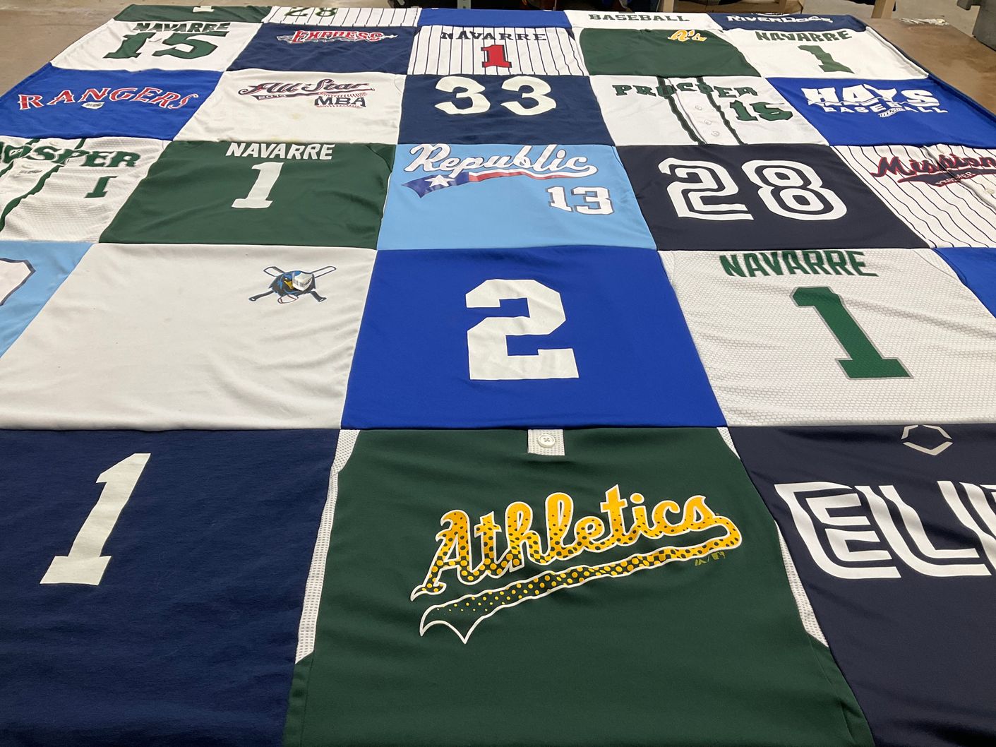 T-shirt quilt featuring athletics by Chandra from TX