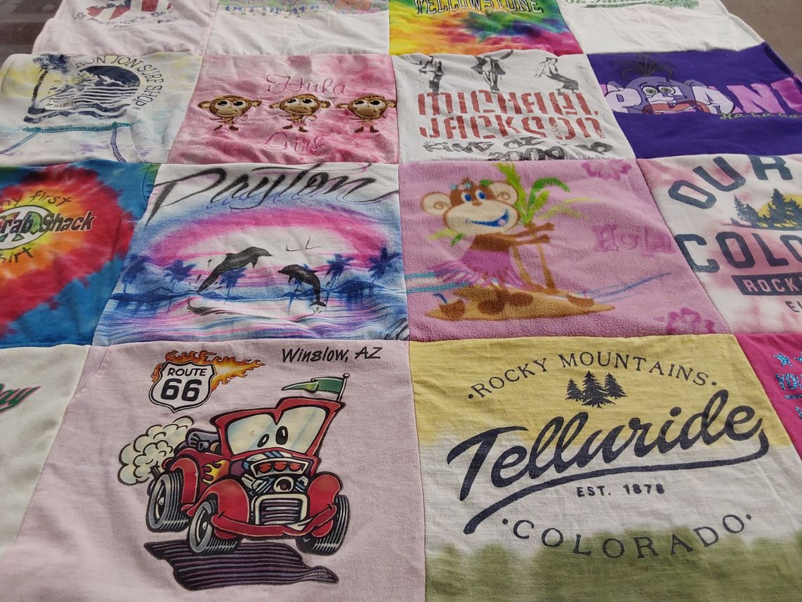 T-shirt quilt with travel, music themes by Nicole from AZ