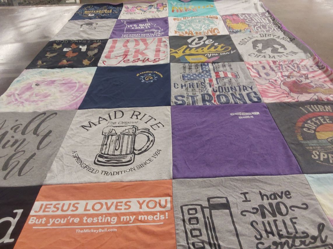 T-shirt quilt with religion, community themes by Jennifer from IL