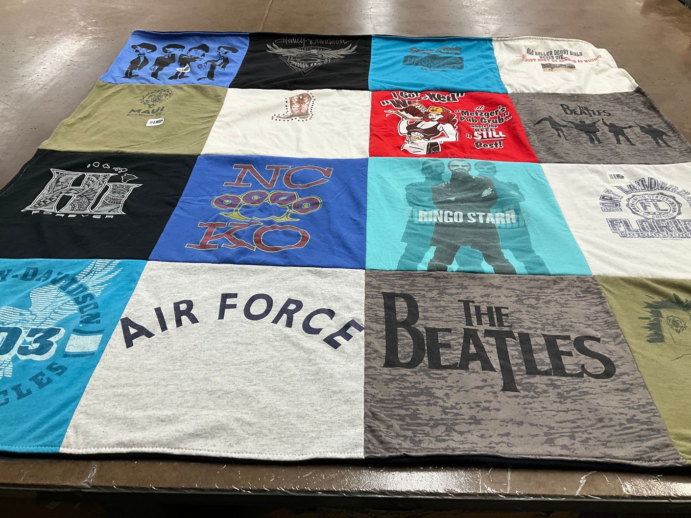 T-shirt quilt with music, sports themes by Dawn from NY