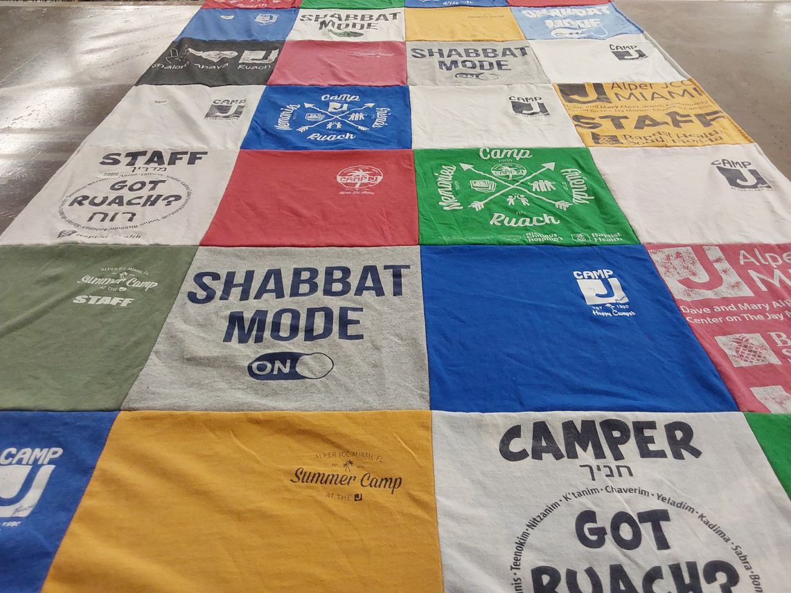 T-shirt quilt with camping, jewish culture themes by Debbie from FL