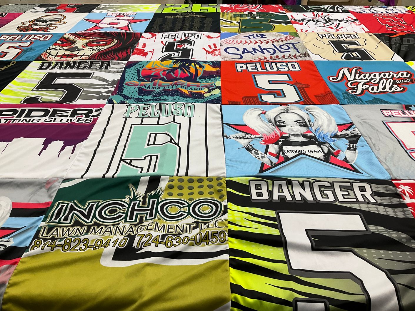 T-shirt quilt with lawn care, sports themes by Jennifer from PA