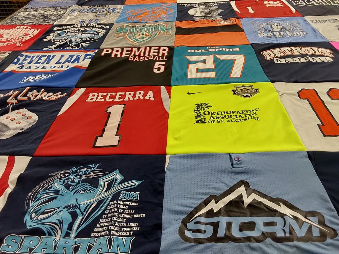 T-shirt quilt featuring seven lakes high school, dolphins by Coral from TX