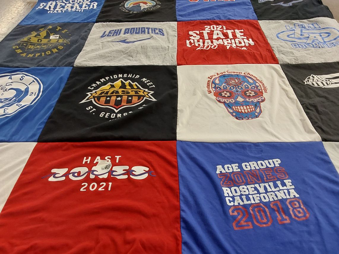 T-shirt quilt with swimming, competition themes by Jill from UT