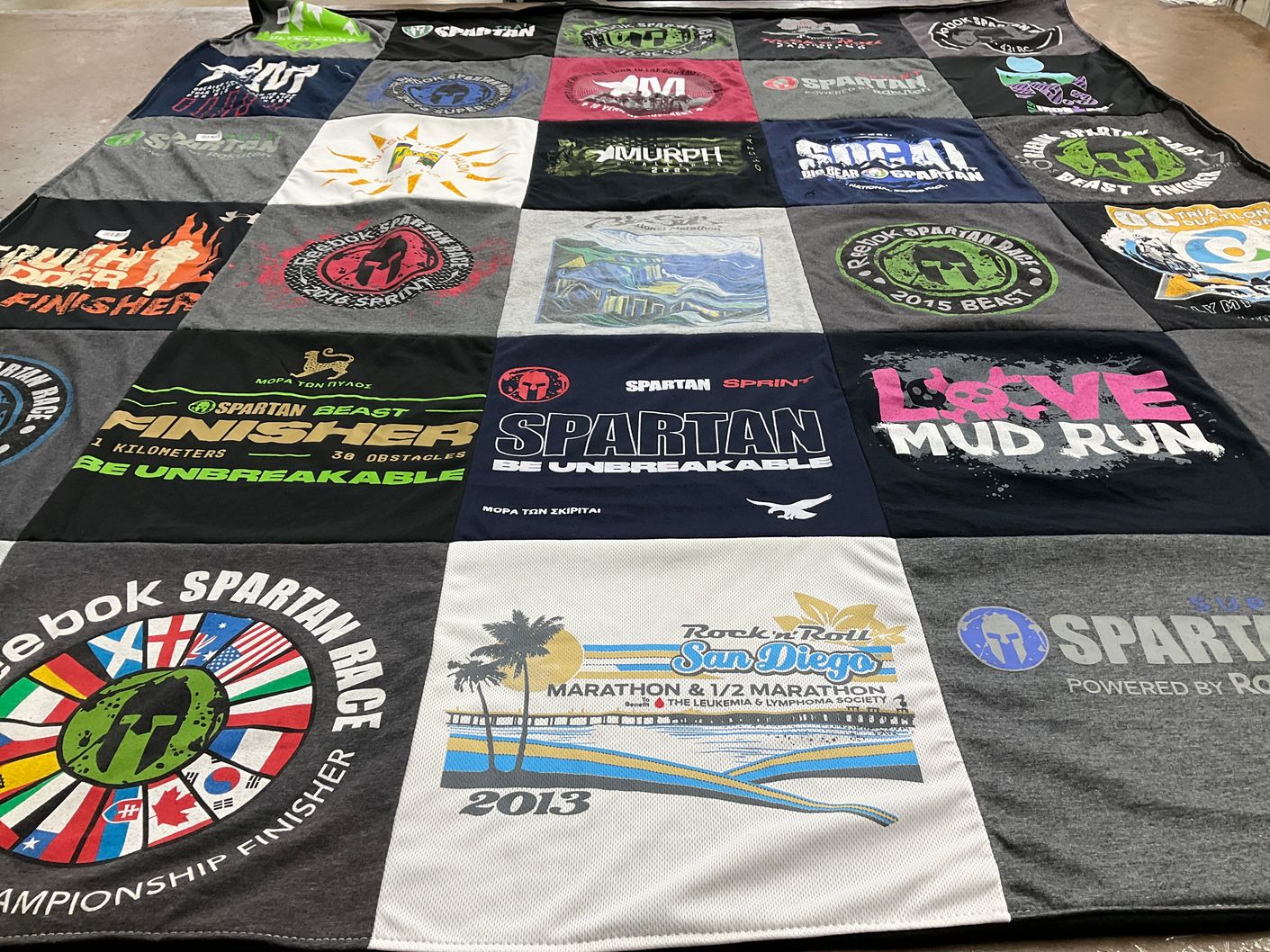 T-shirt quilt with spartan racing, marathons themes by Julie from CA