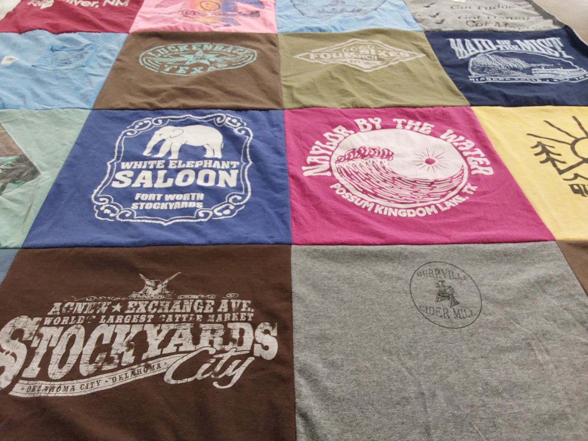 T-shirt quilt with cultural, tourism themes by Deborah from TX