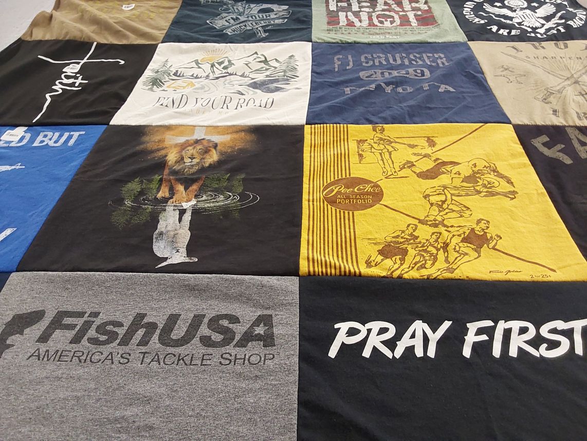 T-shirt quilt with fishing, sports themes by Lori from OR
