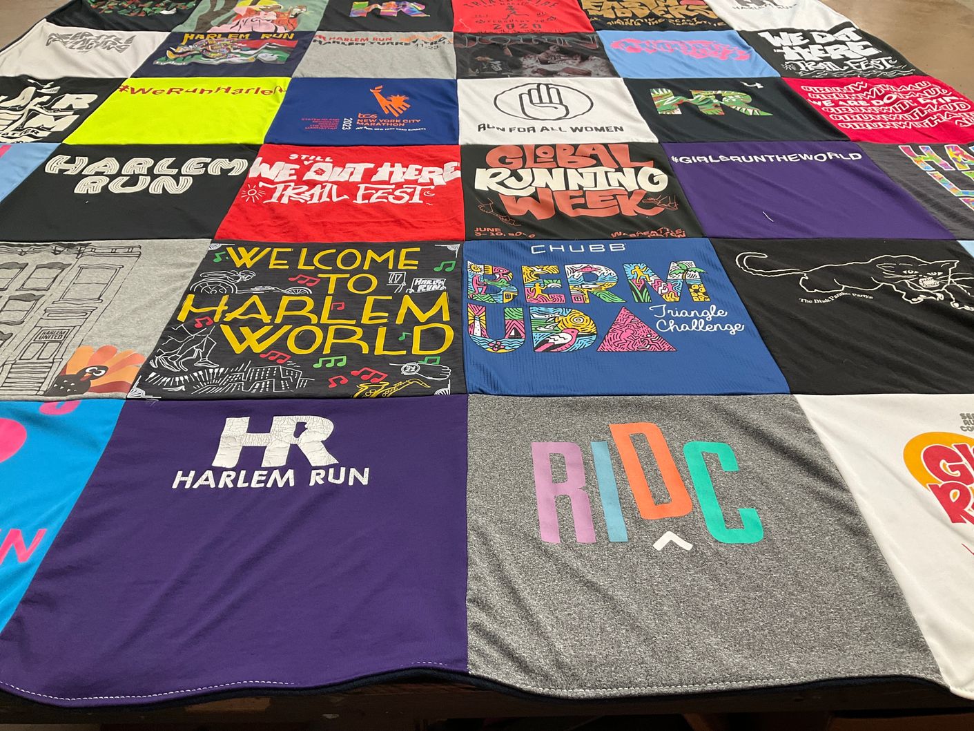 T-shirt quilt with running, community events themes by Alison Mariella from WA