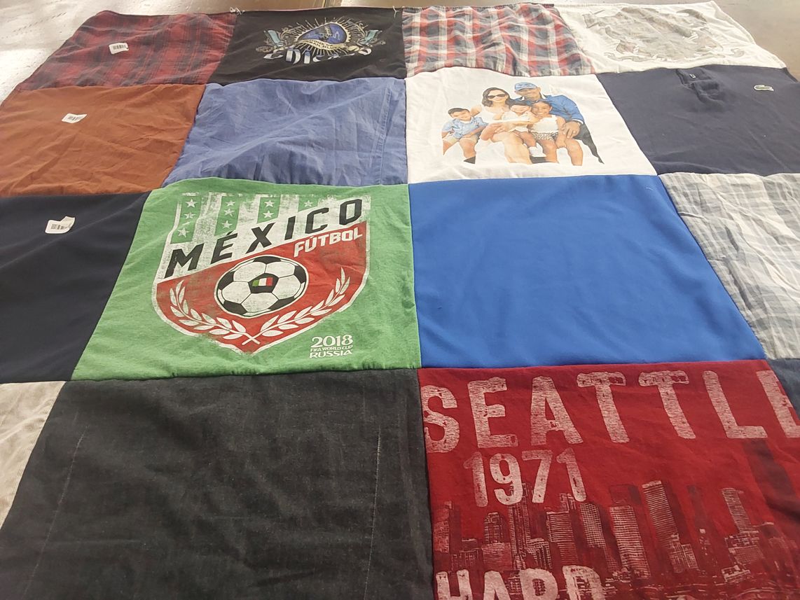 T-shirt quilt with soccer, family themes by Erica from CA